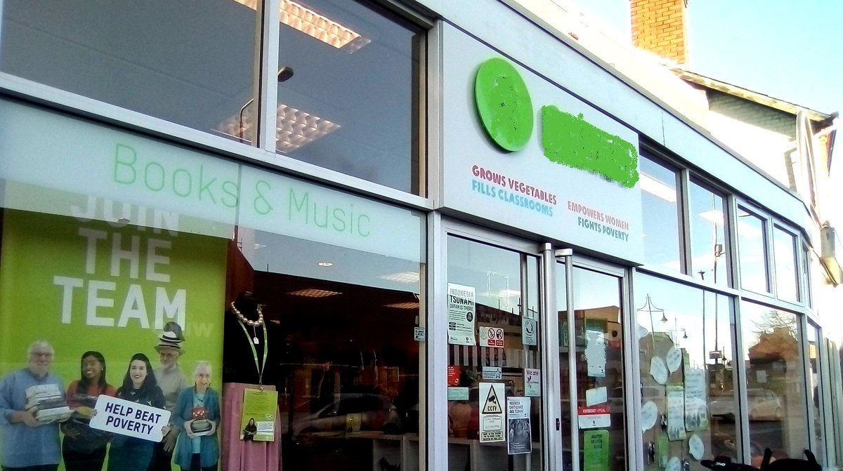 Charity shop assistant in a big shop selling all sorts from furniture to clothes, books, CDs and so on